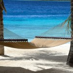 Caribbean honeymoon destinations - a beach hammock at Harbour Village in Bonaire.