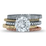 Stackable rings around engagement ring