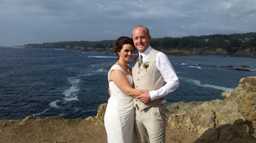 Married couple by the Brewery Gulch Inn shoreline