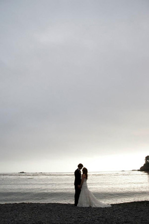 Married couple by the shore at Little River Inn