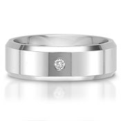 The C75605-7GA is a titanium wedding band with a 0.05 carat round brilliant cut diamond.