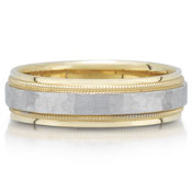 X4360-7GT is a two-tone hammered wedding band that is 7mm wide.