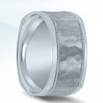 Carved wedding band by Novell - available in platinum or gold.